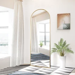 WallBeyond 64"x21" Arched Aluminum Leaner Mirror With Kickstand Gold -Umbra Home Decor Shop GUEST 305cecc7 7a46 4eef b389 e1a3dd5c9ad4