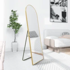 WallBeyond 64"x21" Arched Aluminum Leaner Mirror With Kickstand Gold -Umbra Home Decor Shop GUEST e575a46e bf34 43a7 a1ac 18269d3b0ca3